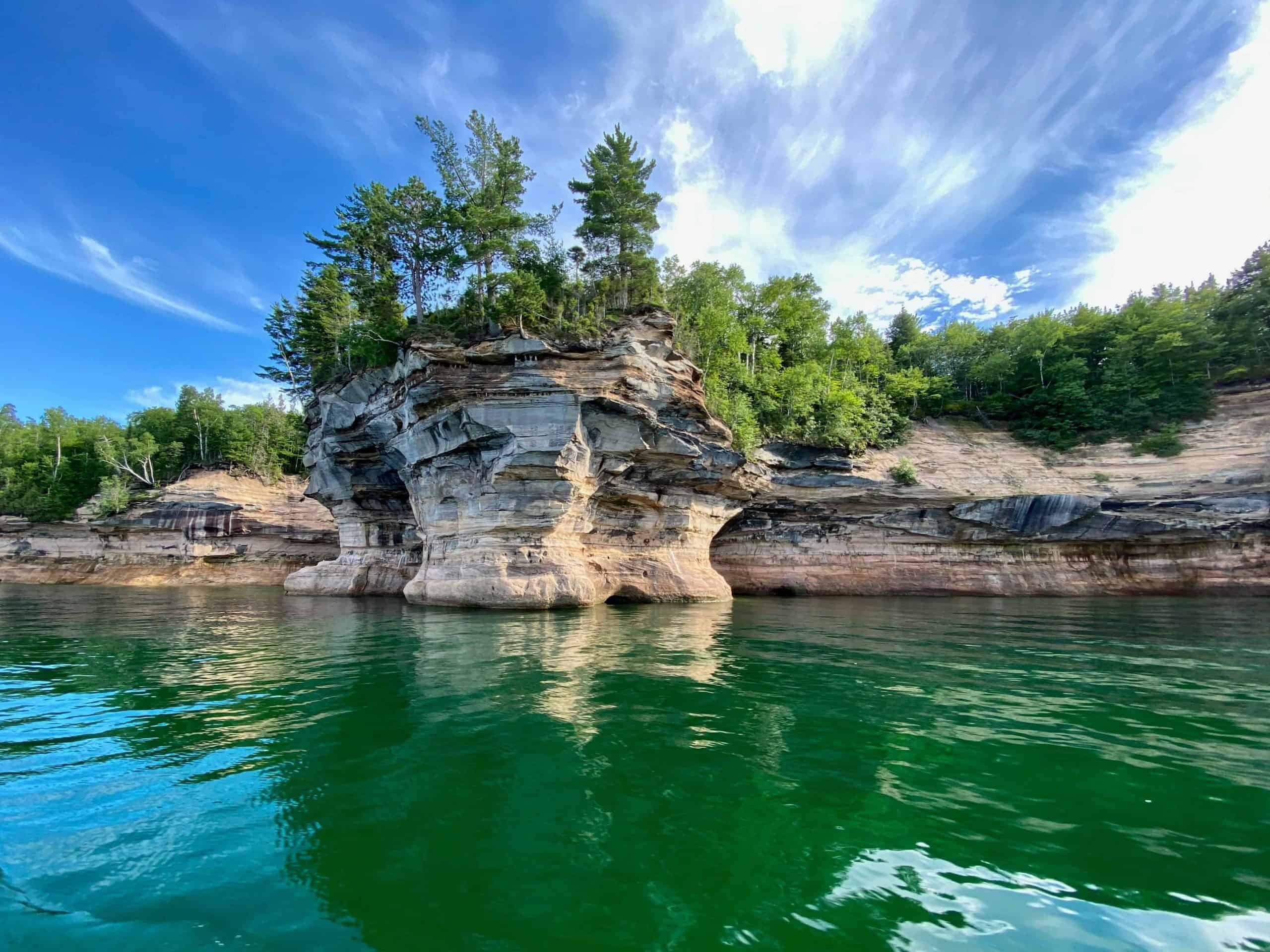 The sandstone cliffs and turquoise water at Pictured Rocks